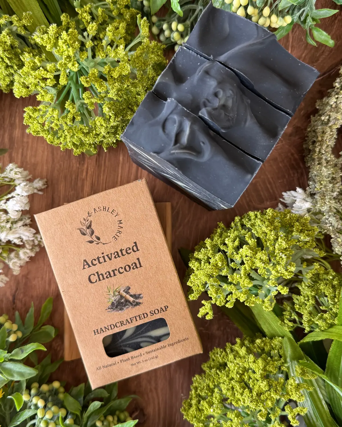 Activated Charcoal -Boxed Soap photographed on wood with dried flowers