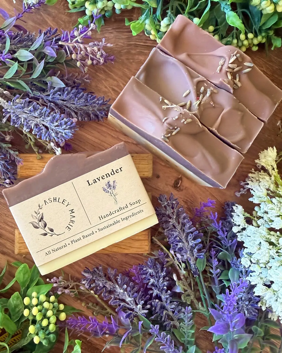 Lavender Soap photographed on wood with dried flowers