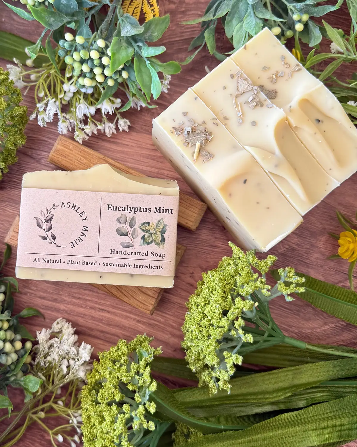 Eucalyptus Mint Soap photographed on wood with dried flowers