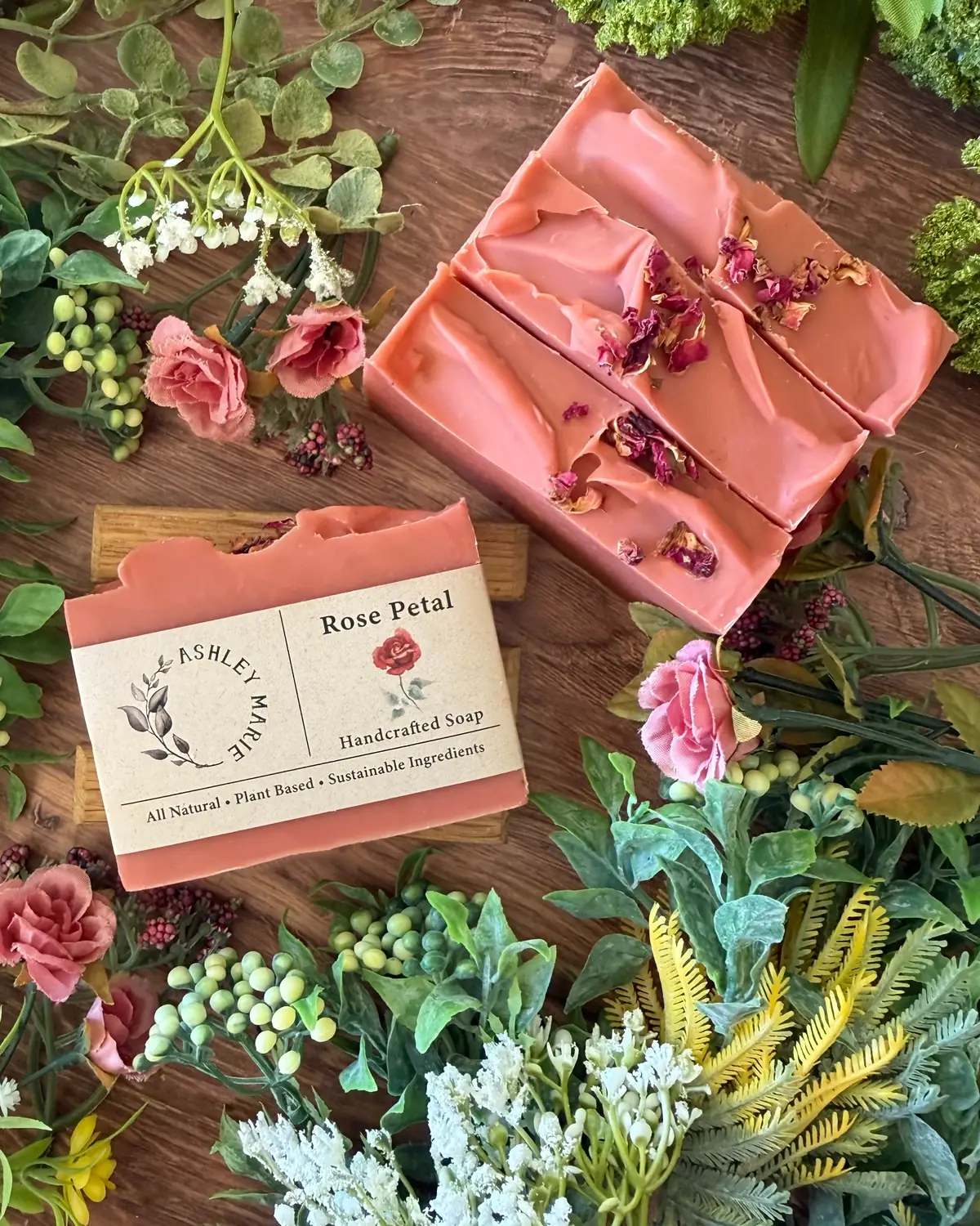 Rose Petal Soap photographed on wood with dried flowers