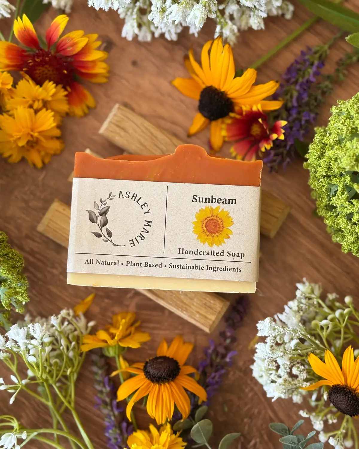 Sunbeam Soap photographed on wood with dried flowers