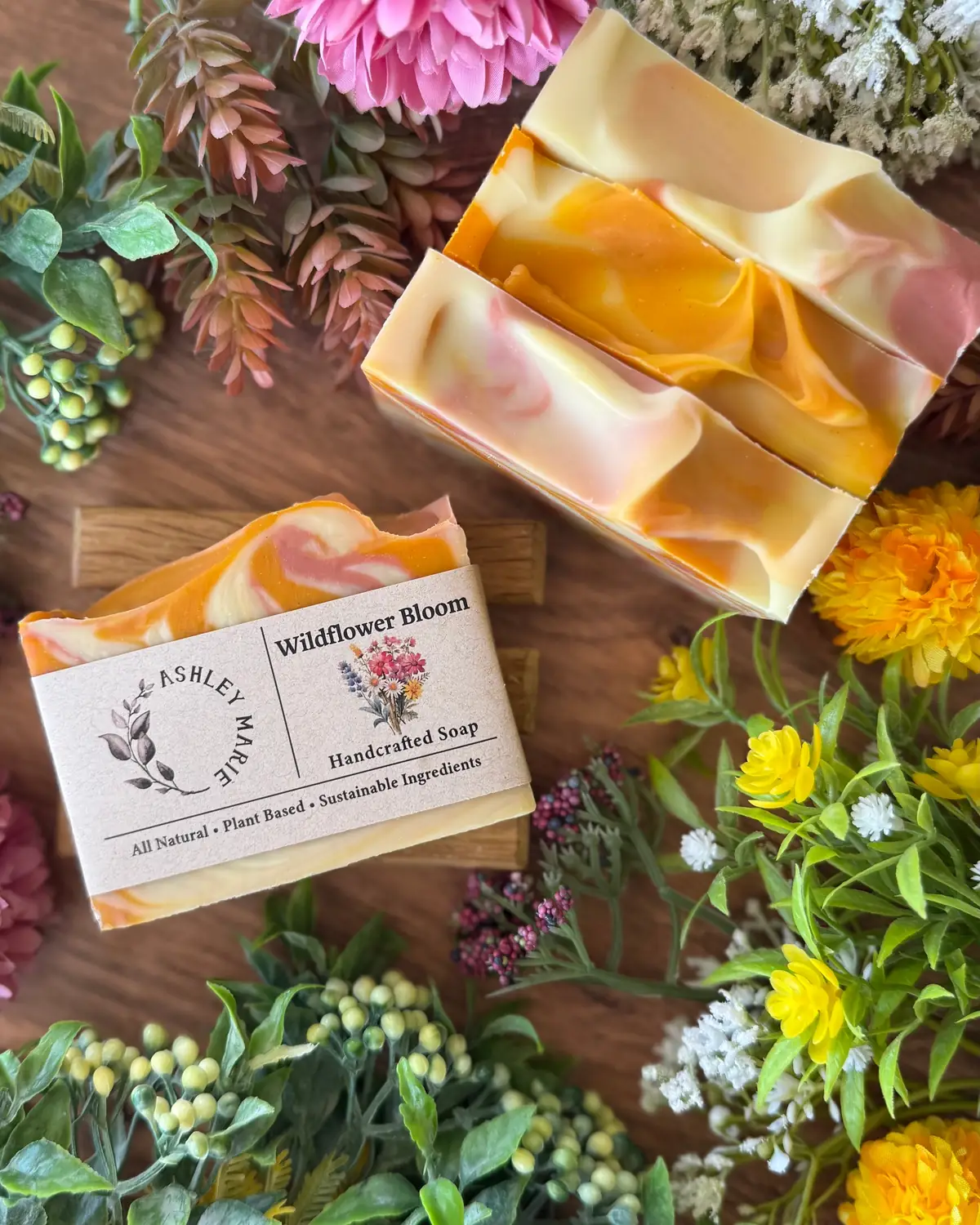 Wildflower Bloom Soap photographed on wood with dried flowers