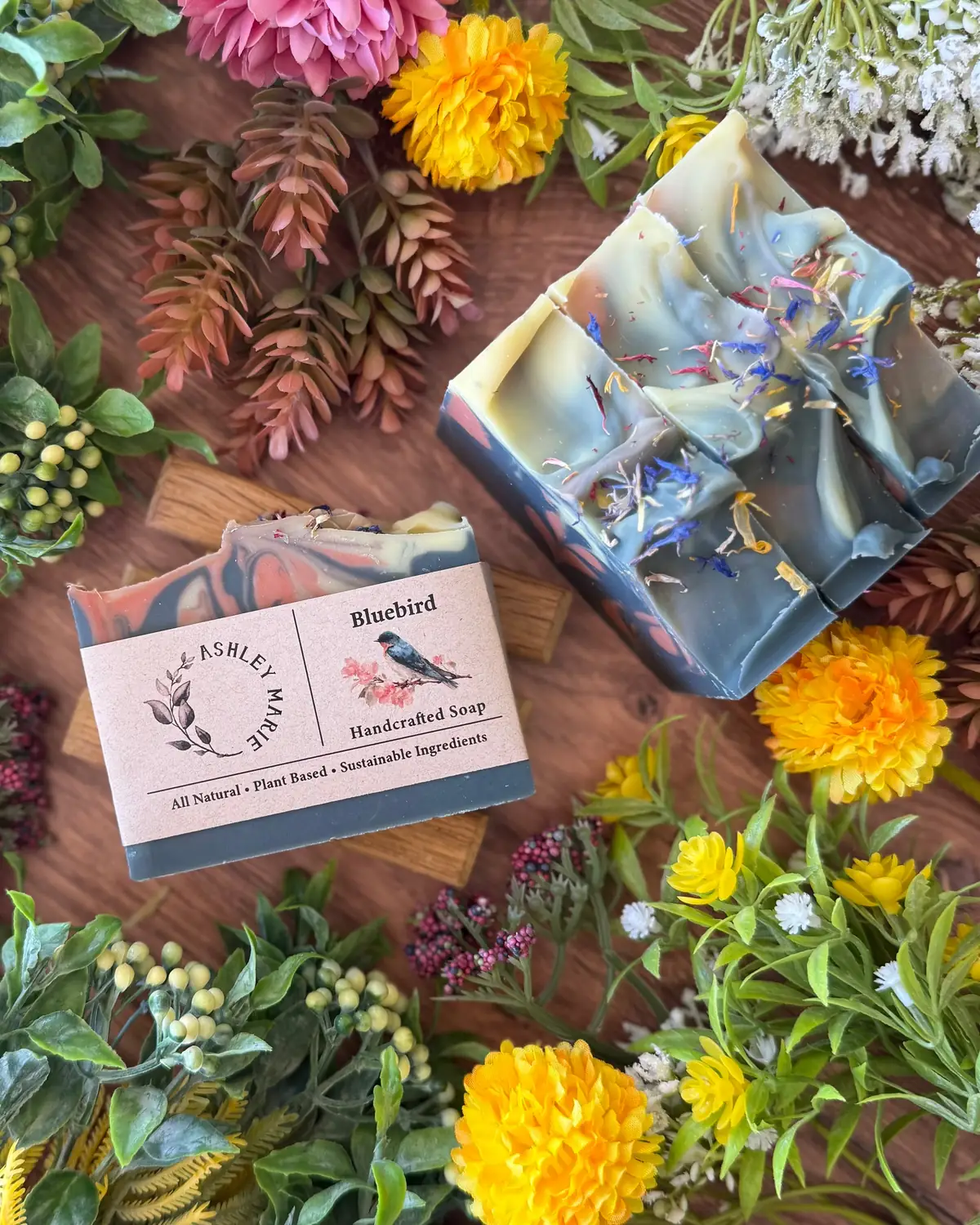 Bluebird Soap photographed on wood with dried flowers