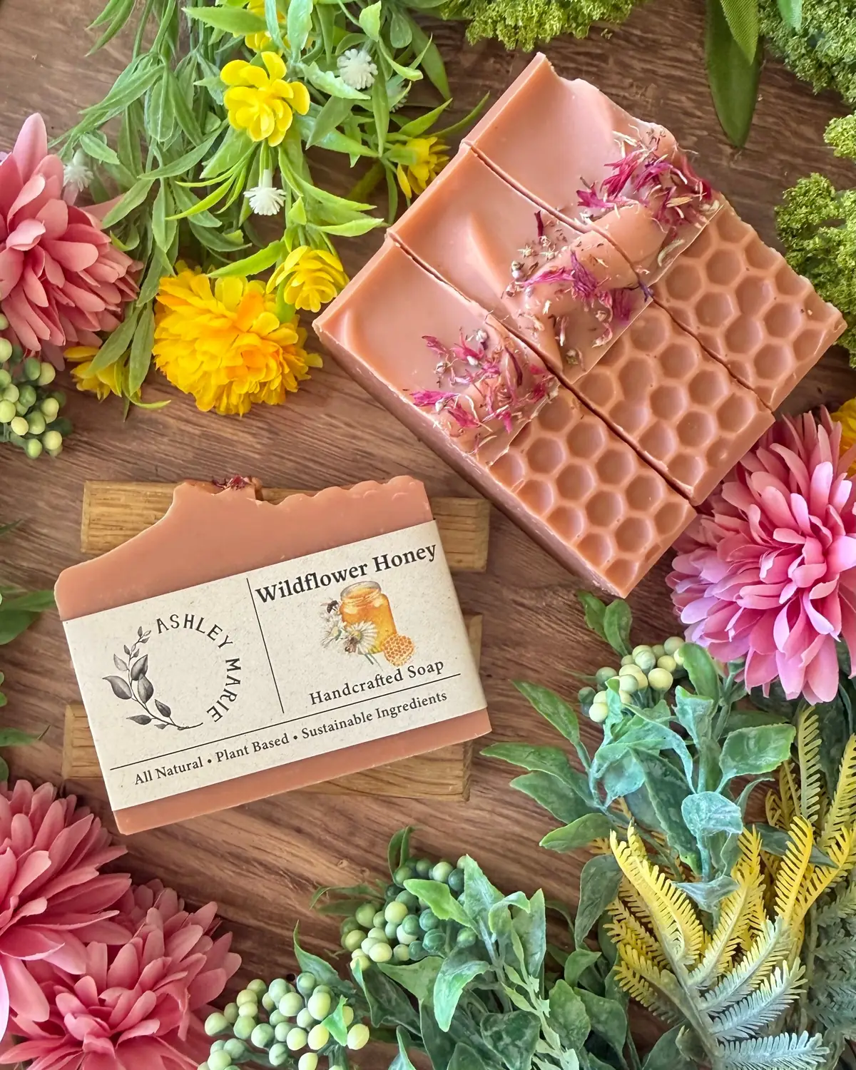 Wildflower Honey Soap photographed on wood with dried flowers